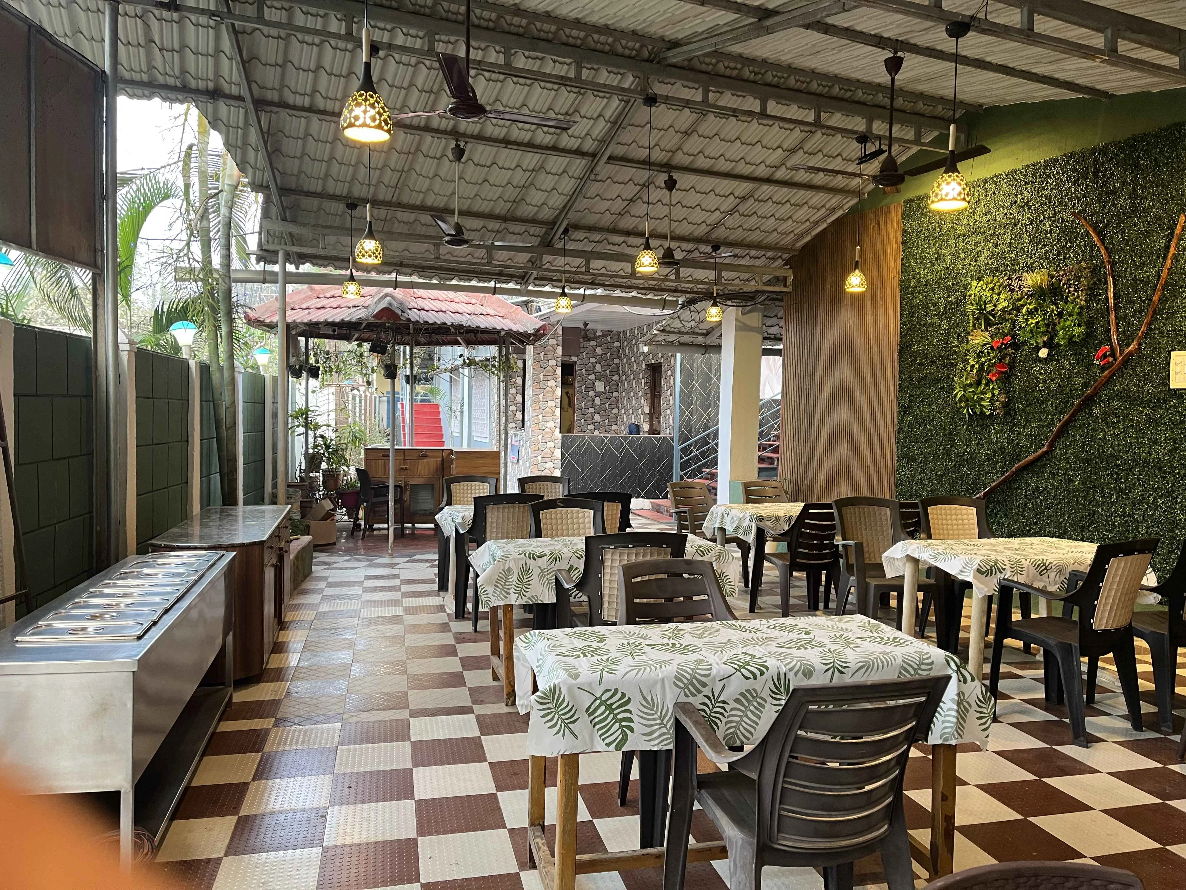 Family dining area at Dolphin House beach resort Nagaon Alibaug