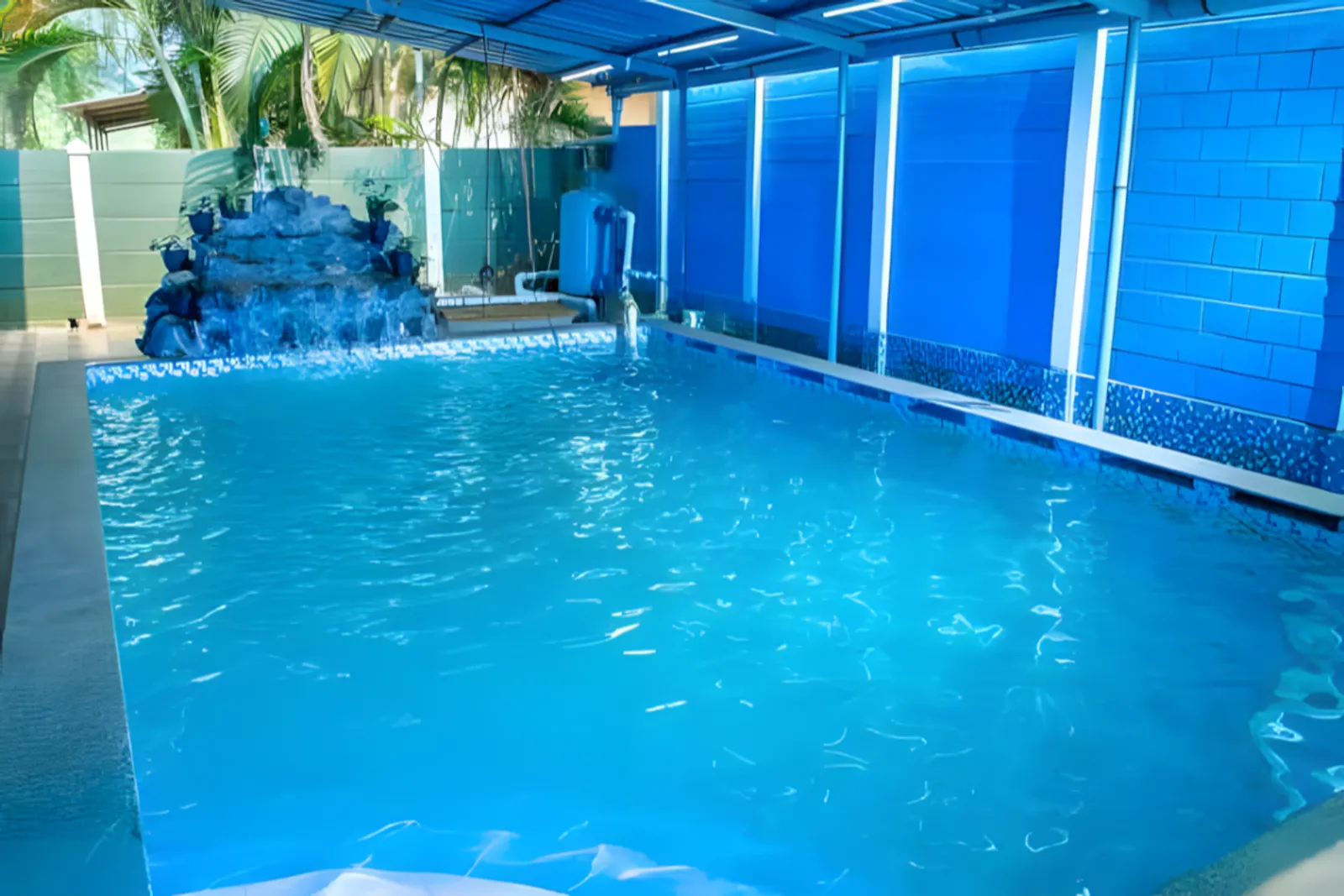 Indoor swimming pool at Dolphin House resort with swimming pool in Alibaug
